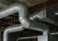 Complex commercial ductwork installation at Vamco Sheet Metal Inc in a large building project