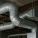 Complex commercial ductwork installation at Vamco Sheet Metal Inc in a large building project